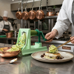 Kh hands on Turning Slicer 19107 in a kitchen making a zuccini garnish in a restaurant